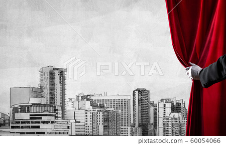 Modern drawn cityscape behind drapery curtain and hand opening it Modern drawn cityscape behind drapery curtain and hand opening it 60054066