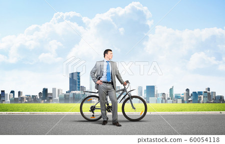 Young man wearing business suit and tie Young man wearing business suit and tie 60054118