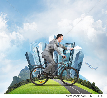 Businessman with paper documents in hand Businessman with paper documents in hand 60054185