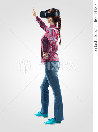 Lady using virtual reality glasses Lady using virtual reality glasses 60054189