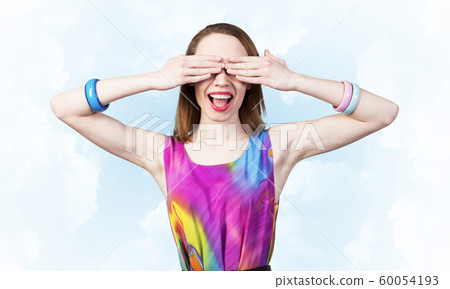 Redhead beautiful girl closing her eyes with hands Redhead beautiful girl closing her eyes with hands 60054193
