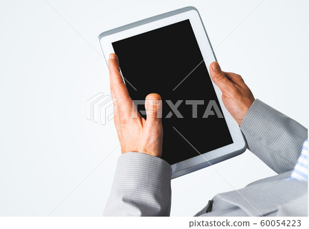 Hands of businessman holding tablet pc with black screen Hands of businessman holding tablet pc with black screen 60054223