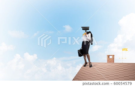 Concept of security and privacy protection with camera headed woman 60054579