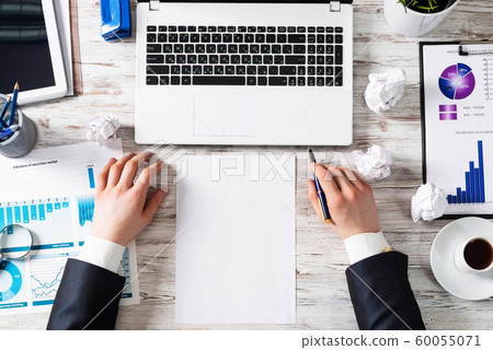 Top view modern office workspace with man hands 60055071