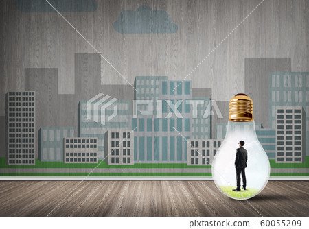 Businessman trapped in bulb Businessman trapped in bulb 60055209
