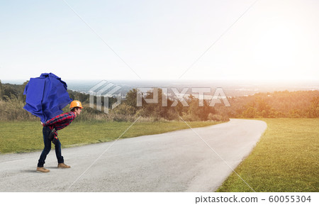 Engineer man carry load Engineer man carry load 60055304
