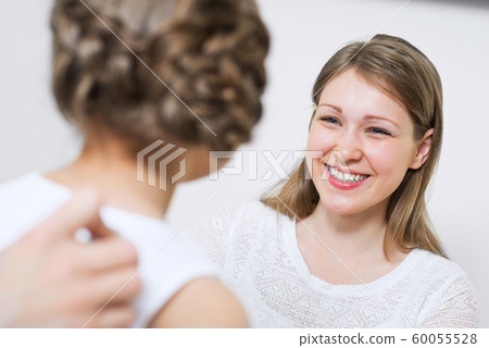 Doctor examining child and listen to lung 60055528