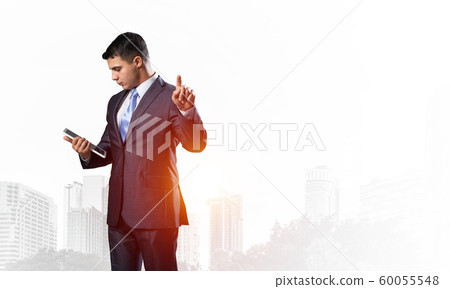 Caucasian man in business suit and tie Caucasian man in business suit and tie 60055548