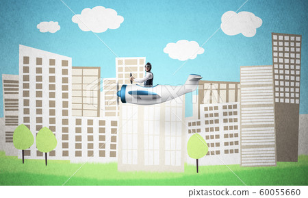 Aircraft pilot sitting in small propeller plane Aircraft pilot sitting in small propeller plane 60055660