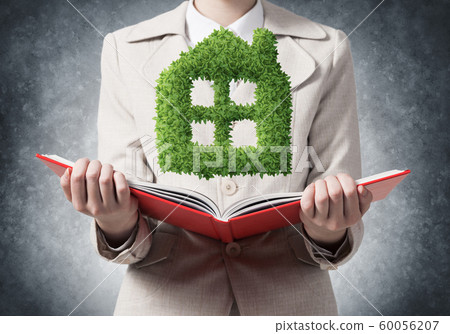 Real estate agent showing green plant Real estate agent showing green plant 60056207