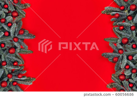 Christmas background with red balls on fir brunches. 60056686