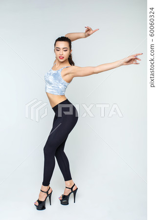 Sexy dancer in black leggings with high heels on Sexy dancer in black leggings with high heels on 60060324