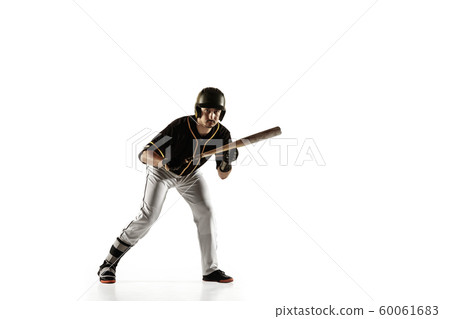 Baseball player, pitcher in a black uniform practicing on a white background. 60061683