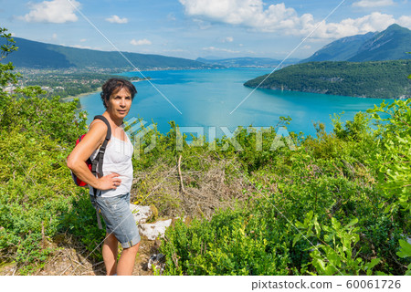 woman watching  view of Lake Annecy 60061726