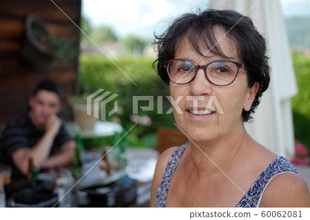 Portrait of a middle-aged brunette woman Portrait of a middle-aged brunette woman 60062081