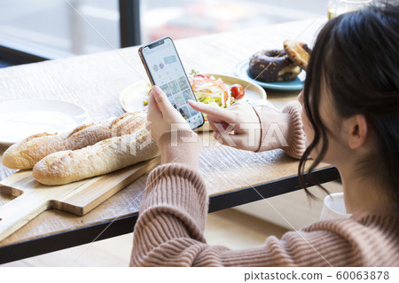 Smartphone filming girls Smartphone filming girls 60063878