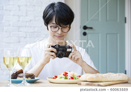 Cooking boy camera photography hobby 60063889