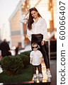 Young girl and child in white shirts 60066407