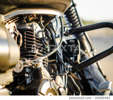motorcycle engine and a motorcycle fuel tank close up 60066483