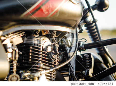 motorcycle engine and a motorcycle fuel tank close up 60066484