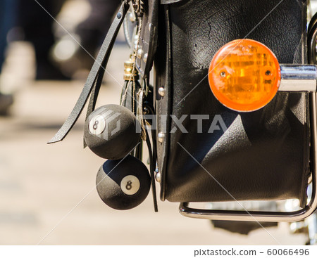talisman balls on a motorcyclist leather bag  60066496