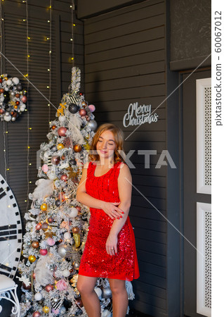 Beautiful happy woman in new year decor. New Year 60067012