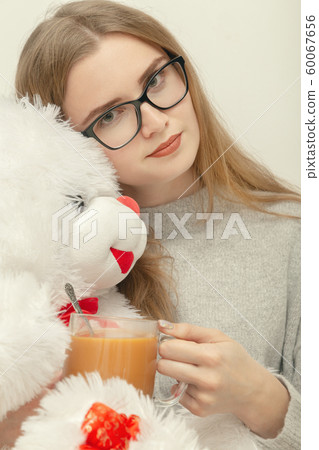 woman with teddy bear woman with teddy bear 60067656