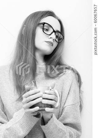 woman with tea mug woman with tea mug 60067657