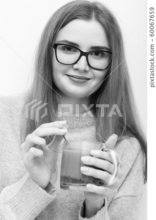 woman with tea mug woman with tea mug 60067659