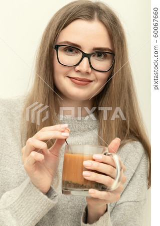 woman with tea mug woman with tea mug 60067660