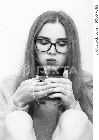 woman with tea mug woman with tea mug 60067665