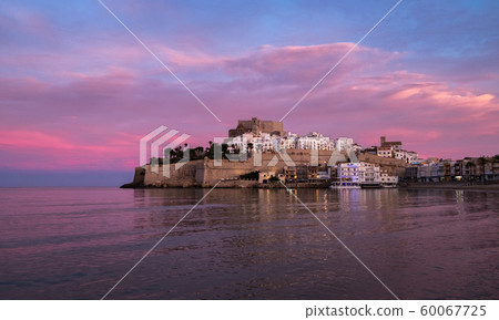 Peniscola skyline and castle beach sunset in Castellon of Spain Peniscola skyline and castle beach sunset in Castellon of Spain 60067725