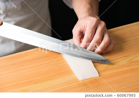 In front of the board to make the squid pine In front of the board to make the squid pine 60067993