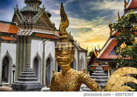 Beautifully stunning gold statue of a Kinnara, a Beautifully stunning gold statue of a Kinnara, a 60078307