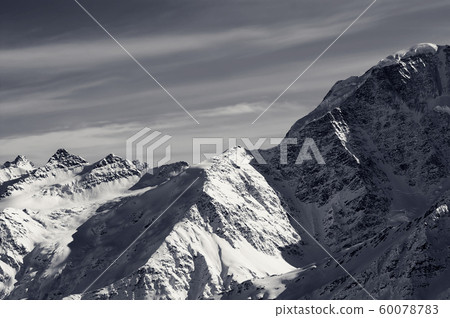 Black and white snowy sunlight mountains 60078783