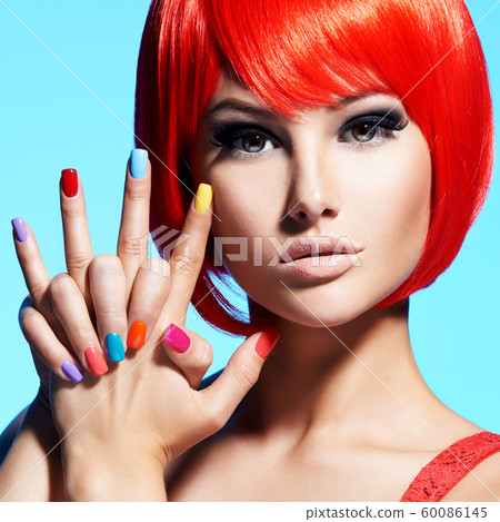 Portrait  of a model with red hairs and multicolor 60086145