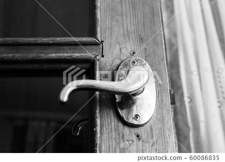 Old vintage door handle closeup 60086835