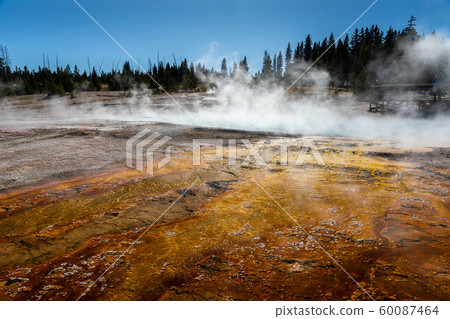 Boiling water with smoke of orange geyser basin. 60087464
