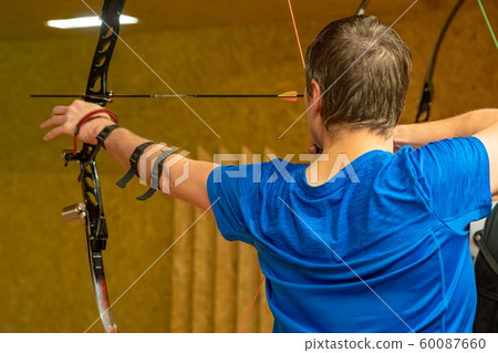 sports archery at the shooting range, competition for the most points to win the cup 60087660