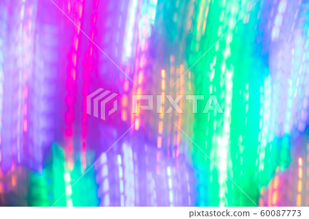 Abstract luminous background of vertical neon lines. Photographic effect of long exposure. Trendy colors. 60087773