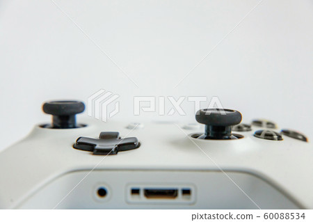 White joystick gamepad, game console isolated on White joystick gamepad, game console isolated on 60088534