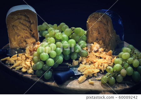 Pieces of parmesan cheeses Pieces of parmesan cheeses 60089242