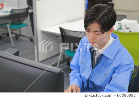 Engineer 1 working in the office Engineer 1 working in the office 60090098