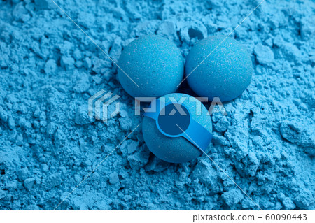 Blue bath bombs with sticker on mixture background 60090443