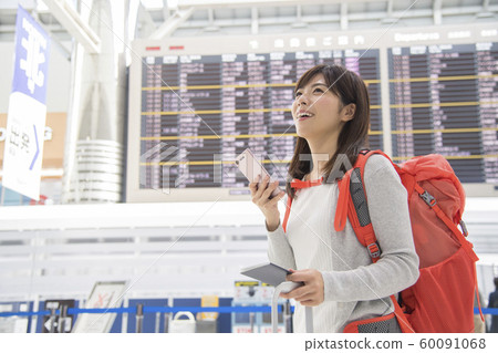 機場大廳公告板女人手機 60091068