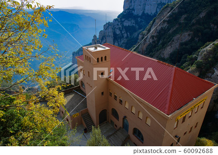 Montserrat's rock formations and sea of clouds, ropeway station 60092688