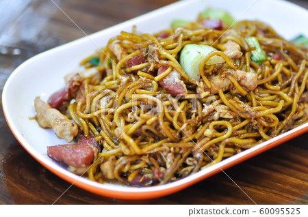 stir-fried noodles with pork, sausage and stir-fried noodles with pork, sausage and 60095525