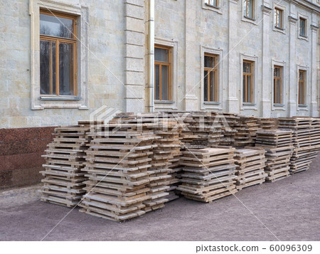 Stack of the wooden elements for building. 60096309