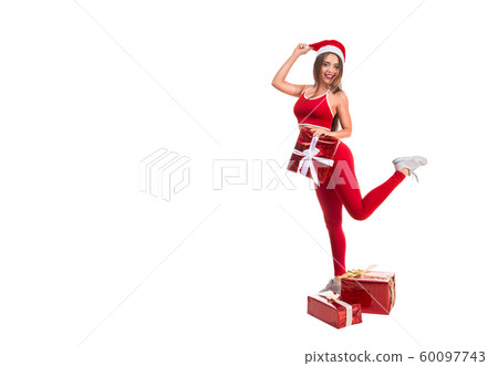 Portrait of young, sexy and beautiful woman in sport suit and Santa hat. White background. Christmas, xmas, x-mas gifts concept 60097743