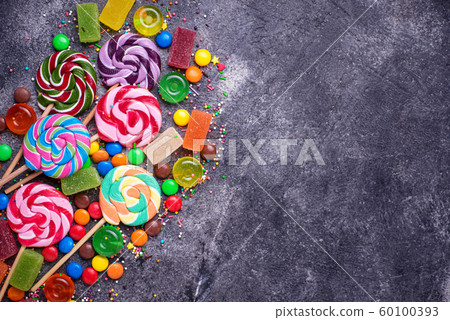 Assortment of colorful candies and lollipops Assortment of colorful candies and lollipops 60100393